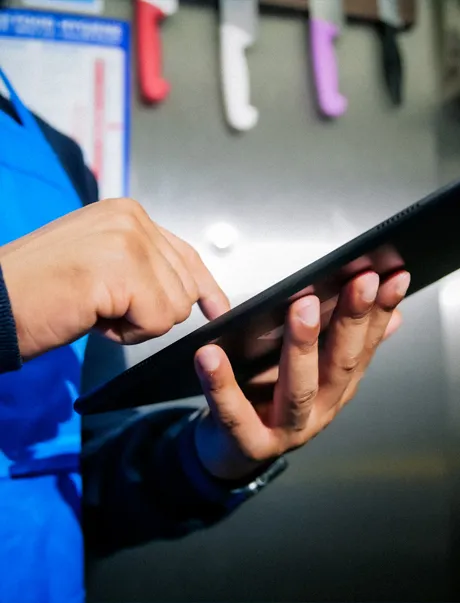 Man using finger to use tablet